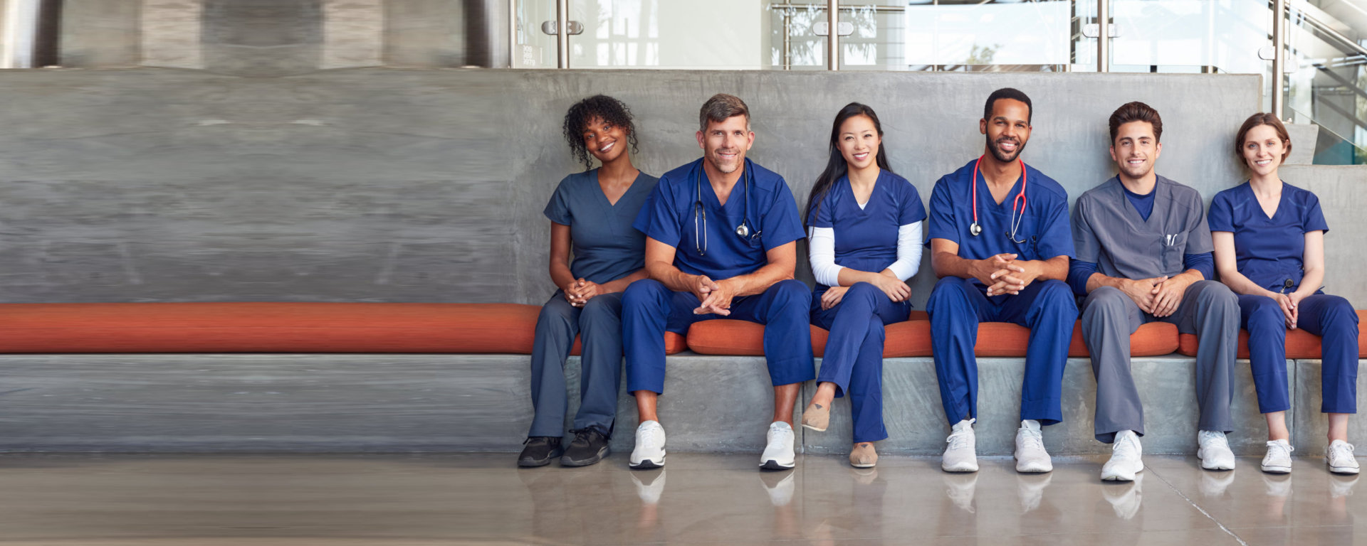 a group picture of nursing smiling