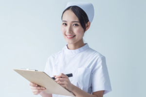 registered nurse holding a pen and checklist notebook