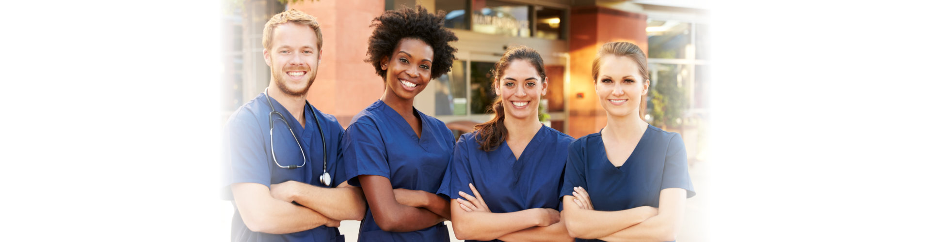 a group picture of nurse smiling