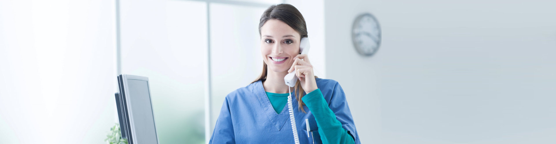 female caregiver answering the telephone call